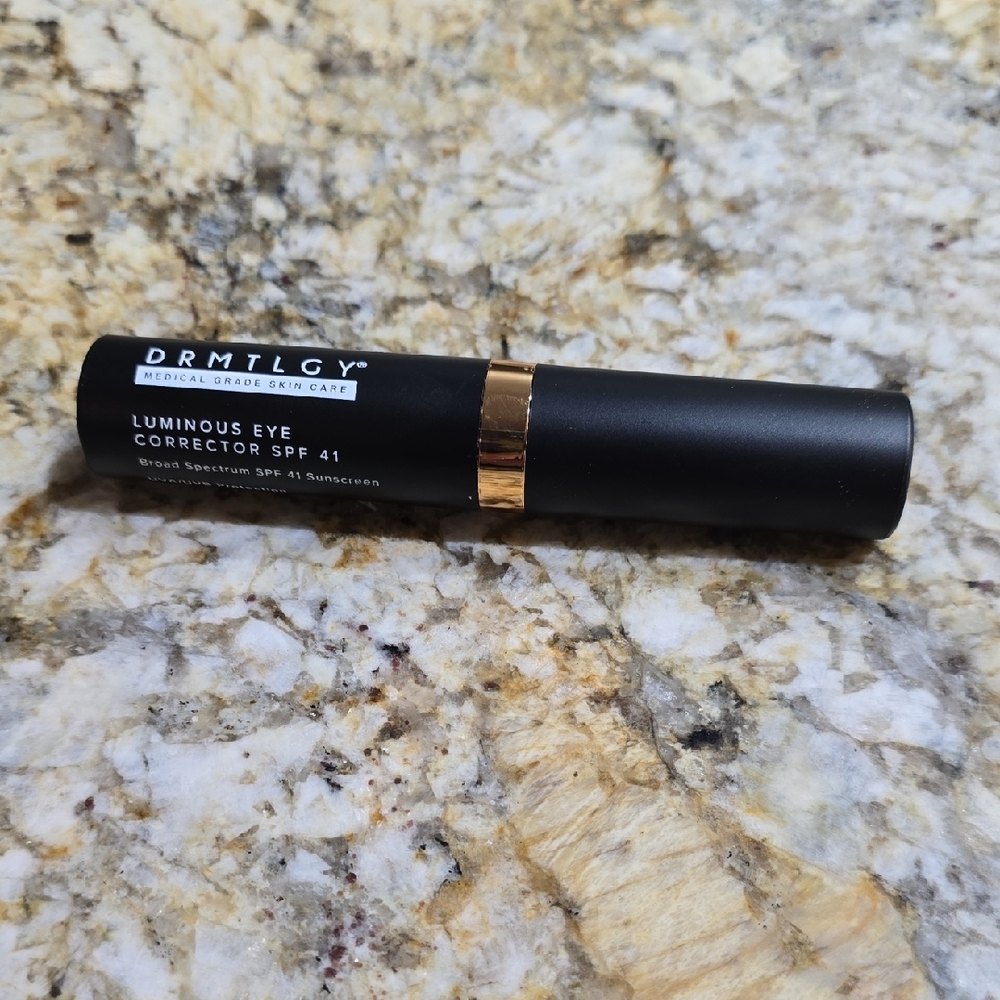 DRMTLGY Luminous Eye Corrector SPF 41 - Black and Gold